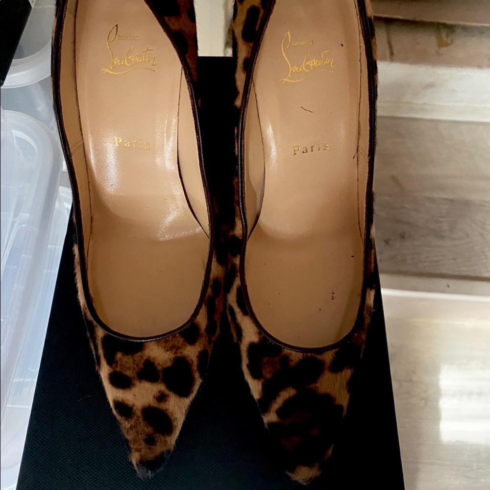 Christian Louboutin animal print pumps